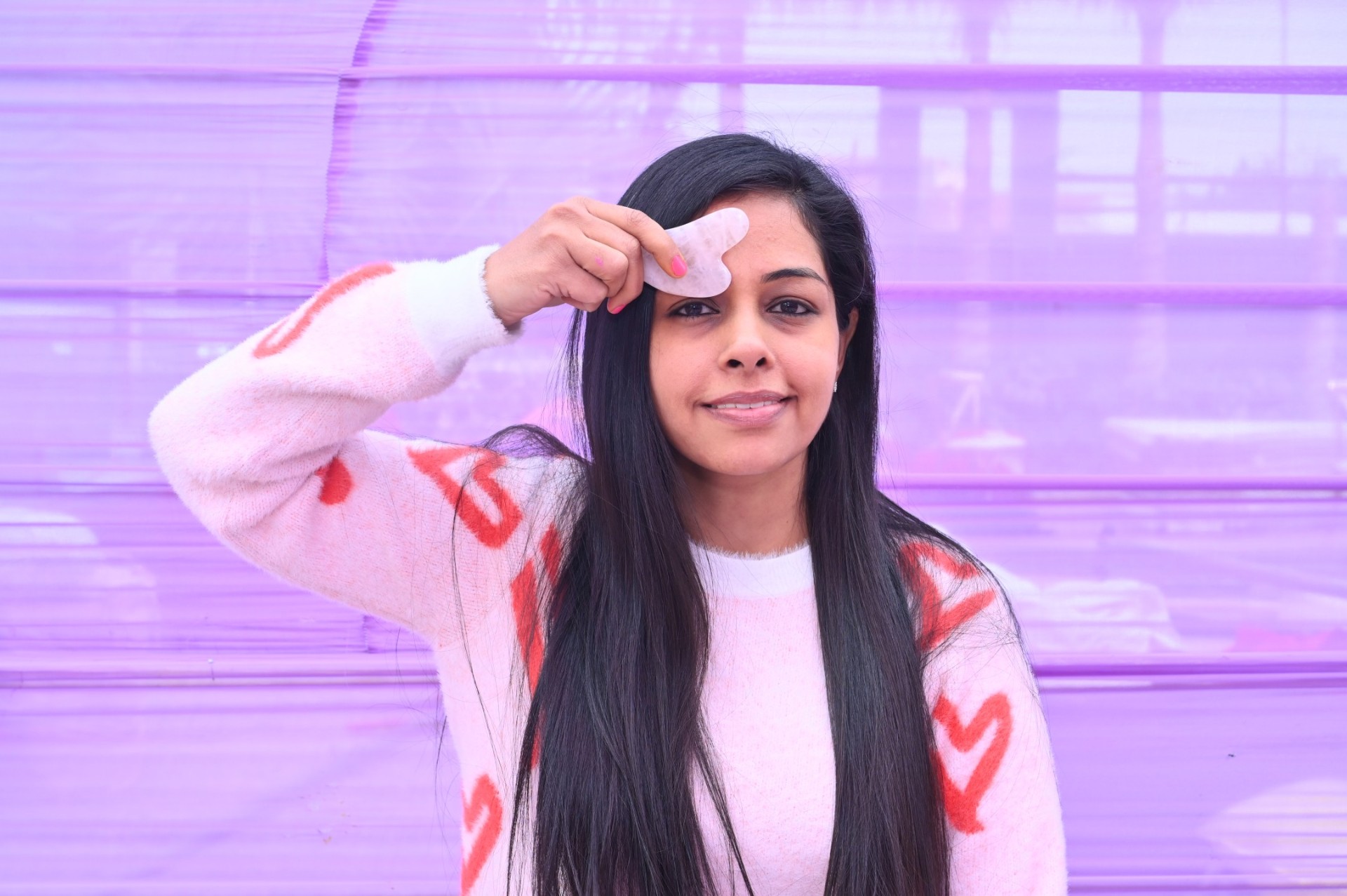 Surbhi using gua sha